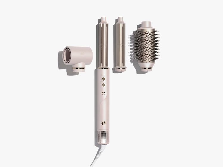 Hair styler with handle, 2 curling rods, and a brush