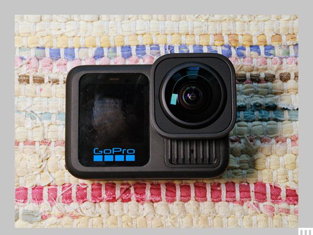 The GoPro Hero 13 Black, a small camera with a digital screen on the left and a square lens on the right