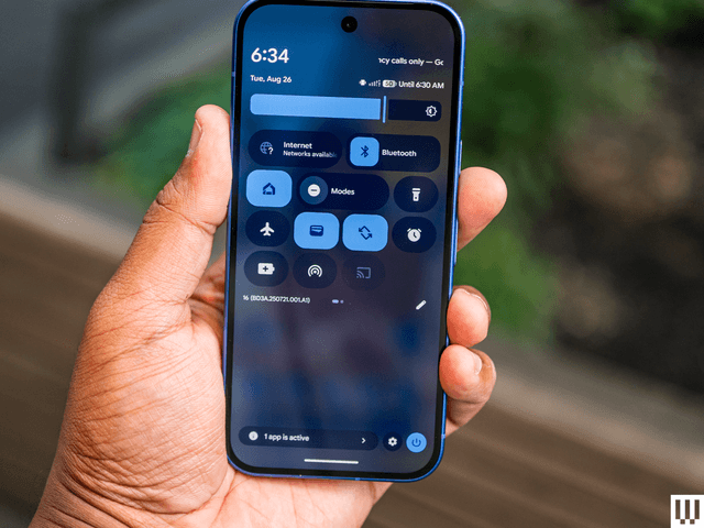 Image may contain: Electronics, Mobile Phone, Phone, and Person