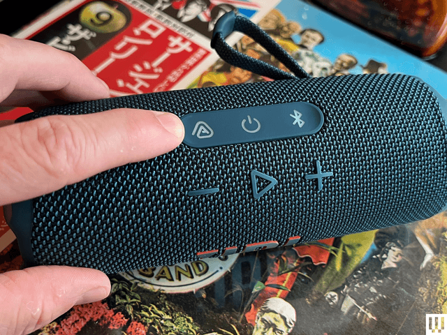 Image may contain: Electrical Device, Microphone, Electronics, Speaker, and Person