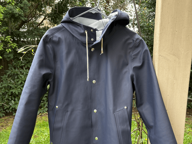 Image may contain: Clothing, Coat, Jacket, and Raincoat