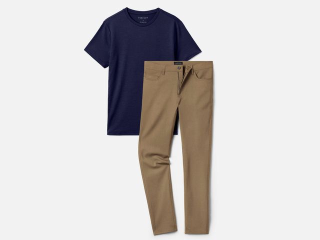 Image may contain: Clothing, Pants, Khaki, and Coat