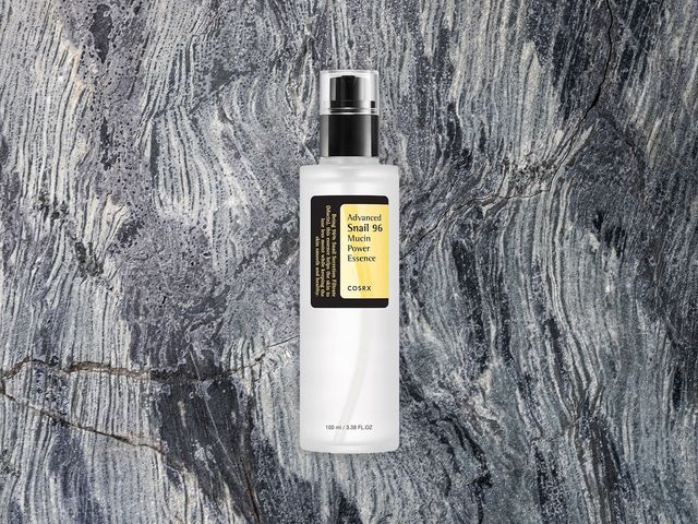 White bottle with black spray top