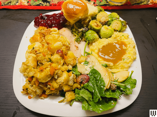 Image may contain: Burger, Food, Food Presentation, Dinner, Plate, and Ketchup