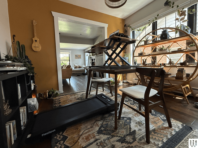 Image may contain: Furniture, Table, Chair, Architecture, Building, Indoors, Living Room, Room, Wood, Floor, and Flooring