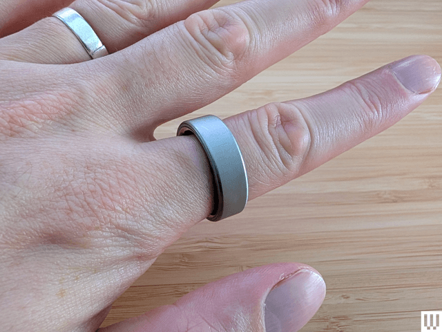 Image may contain: Body Part, Finger, Hand, Person, Accessories, Jewelry, Ring, Baby, and Silver