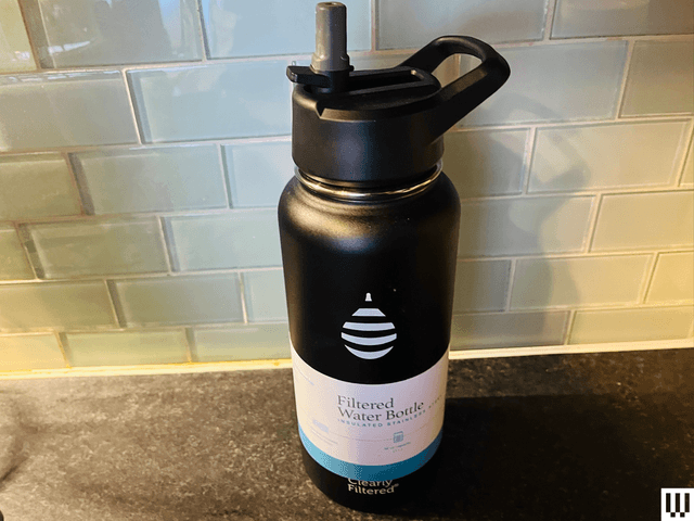 Image may contain: Bottle, Water Bottle, Cosmetics, and Perfume