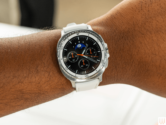 Image may contain: Wristwatch, Arm, Body Part, and Person