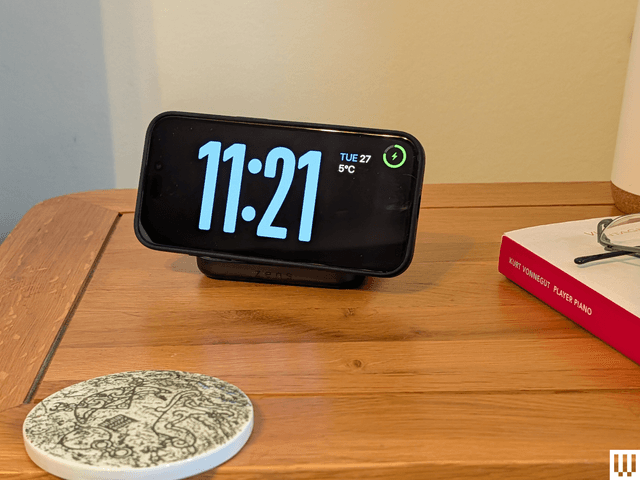 Image may contain: Clock, Digital Clock, Electronics, Mobile Phone, and Phone