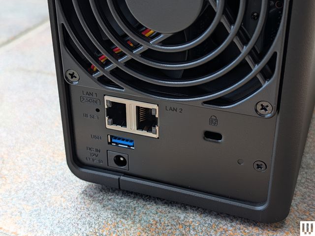 Back of a black computer device, showing the ports