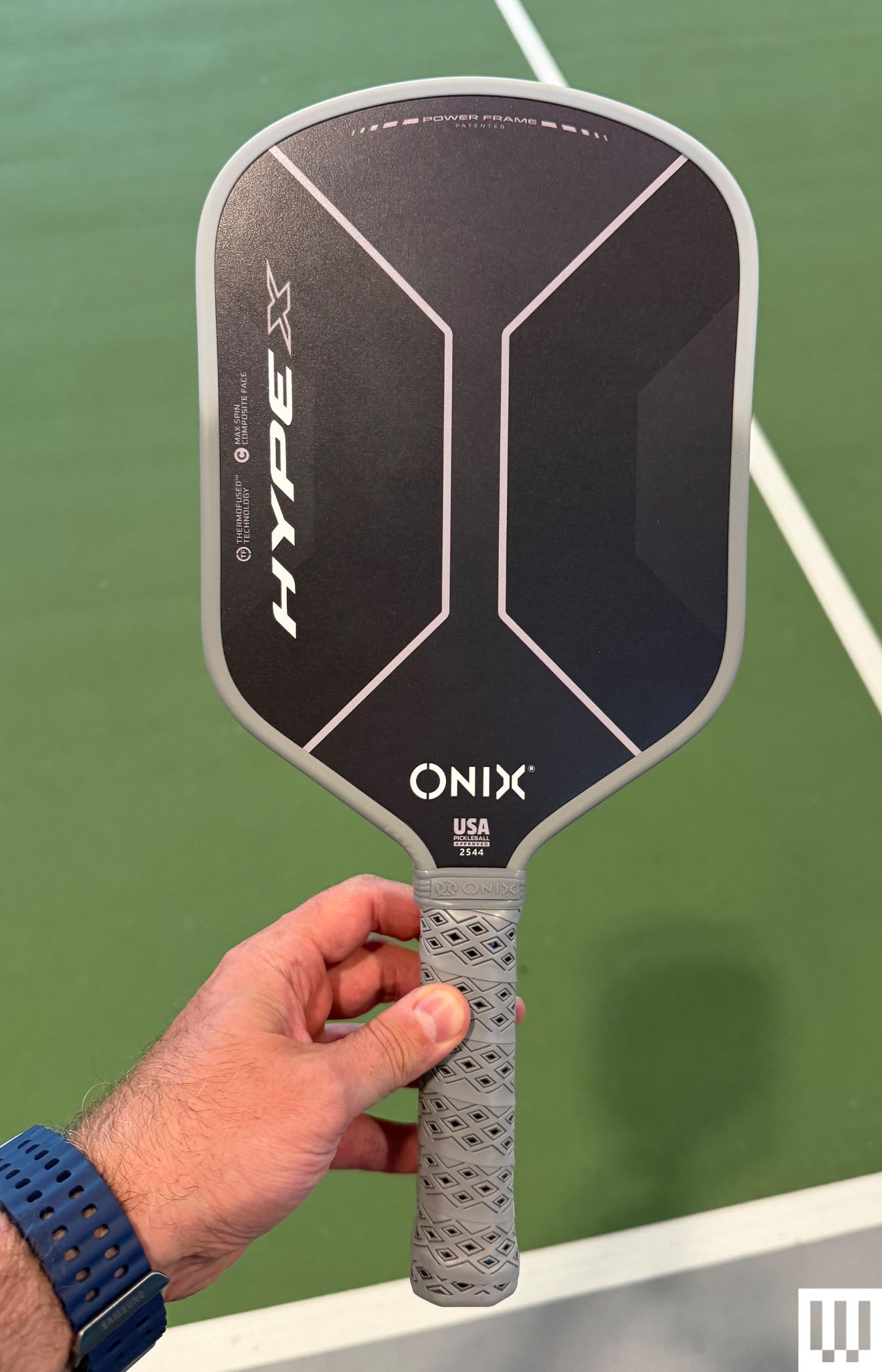 Image may contain Racket Sport Tennis Tennis Racket Ping Pong and Ping Pong Paddle