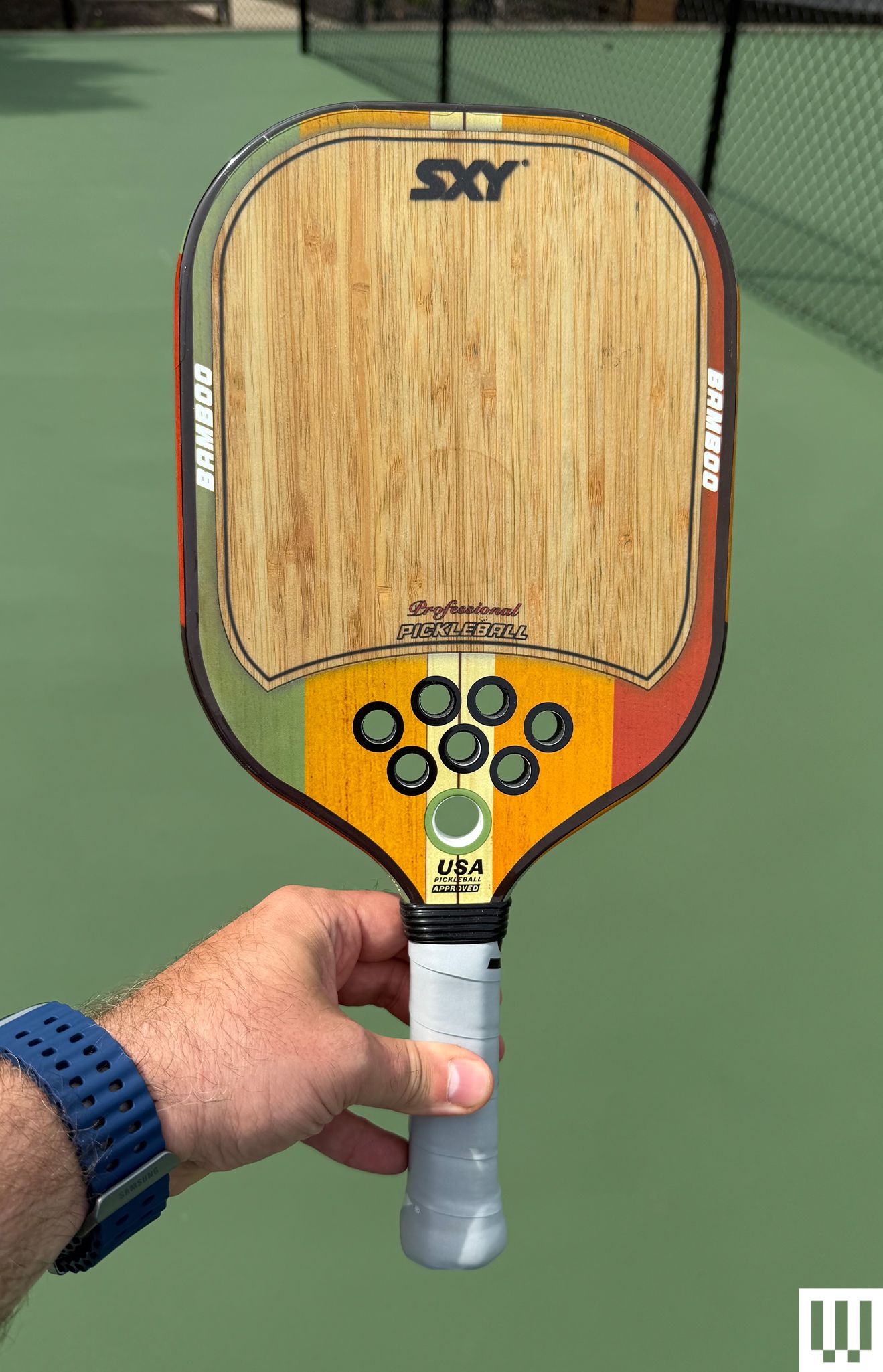 Image may contain Racket Sport Tennis Tennis Racket Indoors Interior Design Wood Ping Pong and Ping Pong Paddle
