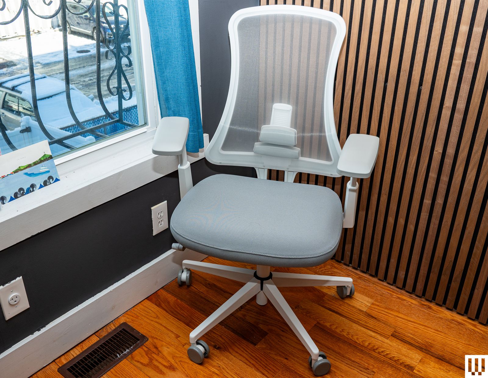 Front view of ProtoArc Flexer Pro a white padded office chair with wheels
