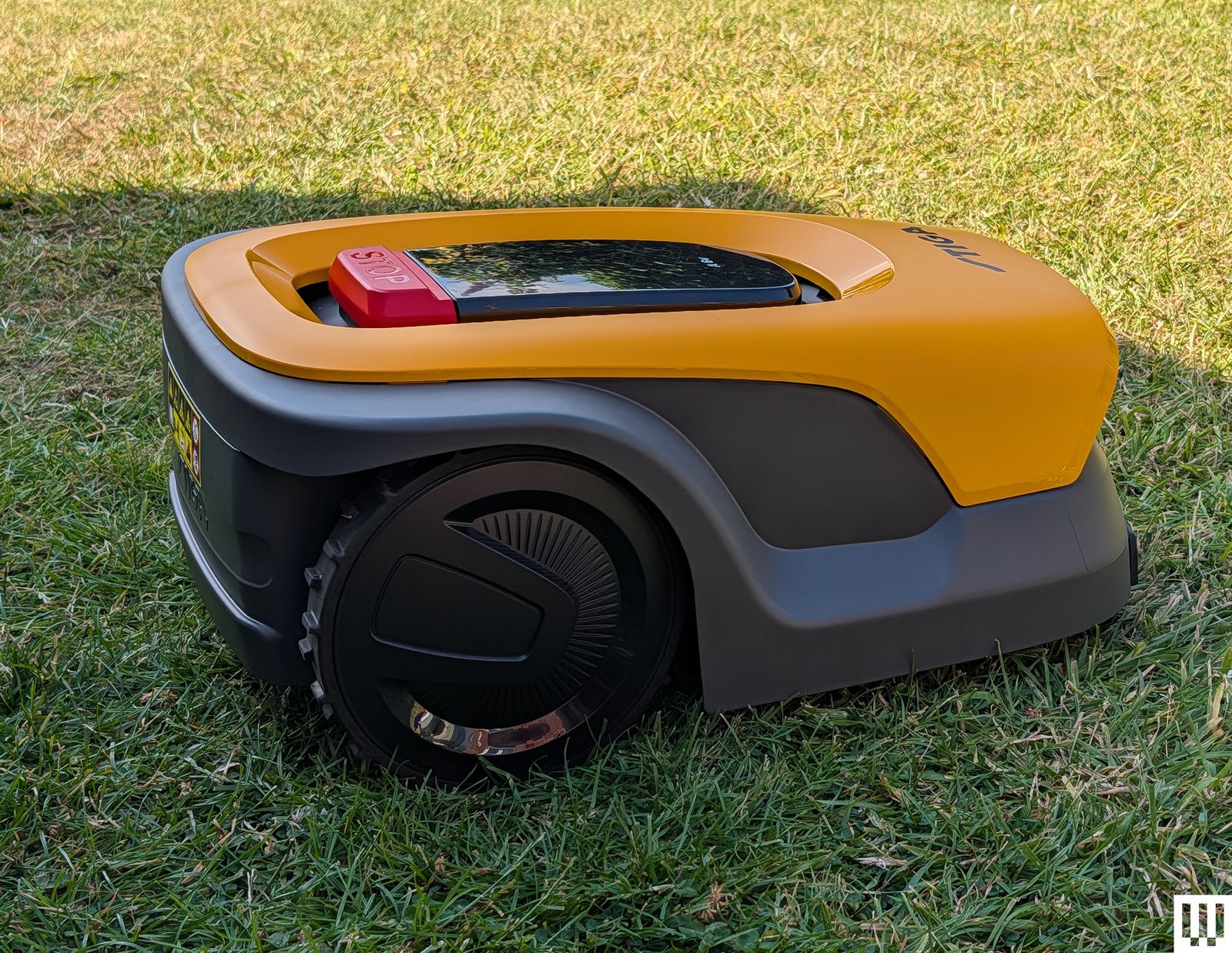 Image may contain Grass Lawn Plant Car Transportation Vehicle Machine Wheel Tire and Device